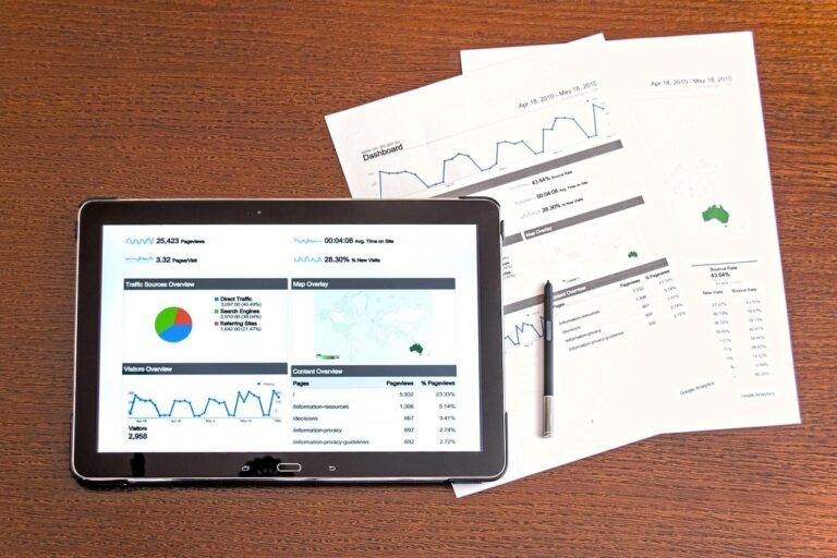 Image featuring a tablet displaying a risk profiling tool, with papers indicating the calculation of a client's risk profile and the subsequent development of a tailored investment strategy. The visual represents the process of assessing risk tolerance and crafting appropriate investment plans.
