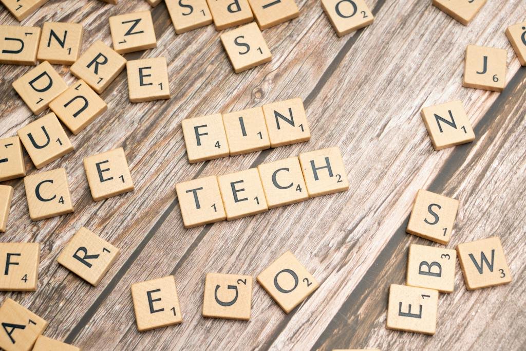 Scrabble tiles spelling out the word fin tech, What future does Paytm hold after RBI's strict new rules? Explore financial impact, user concerns, and the company's roadmap for navigating its next chapter.